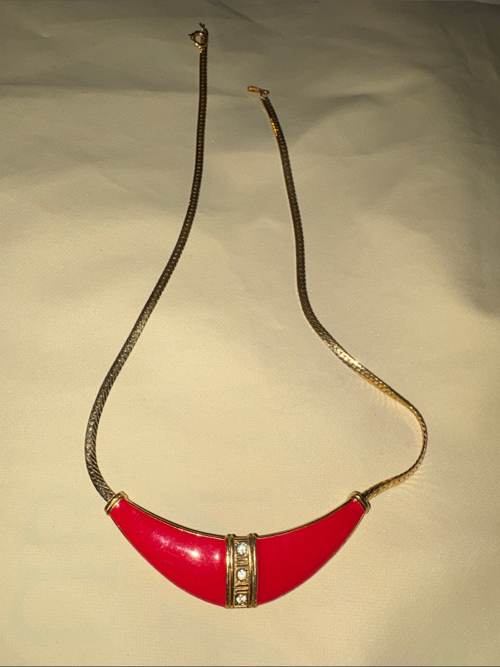 Avon Gold-Tone Necklace with Red Crescent Pendant and Clear Stones